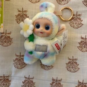 Rainbow Teletubbie Toy with Flower